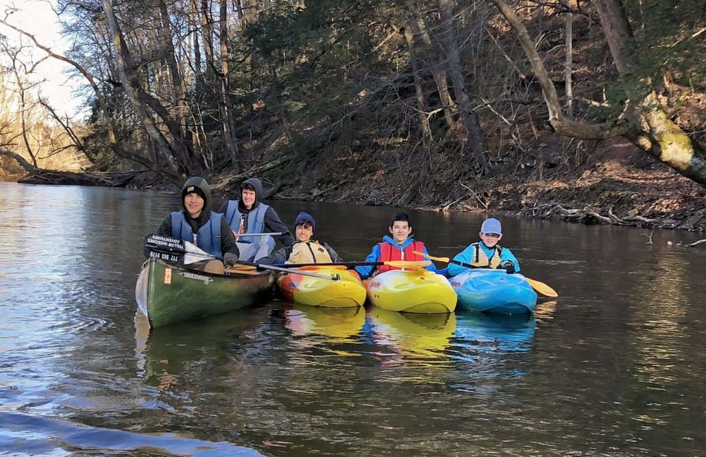 Canoe and kayaks on yellow breeches